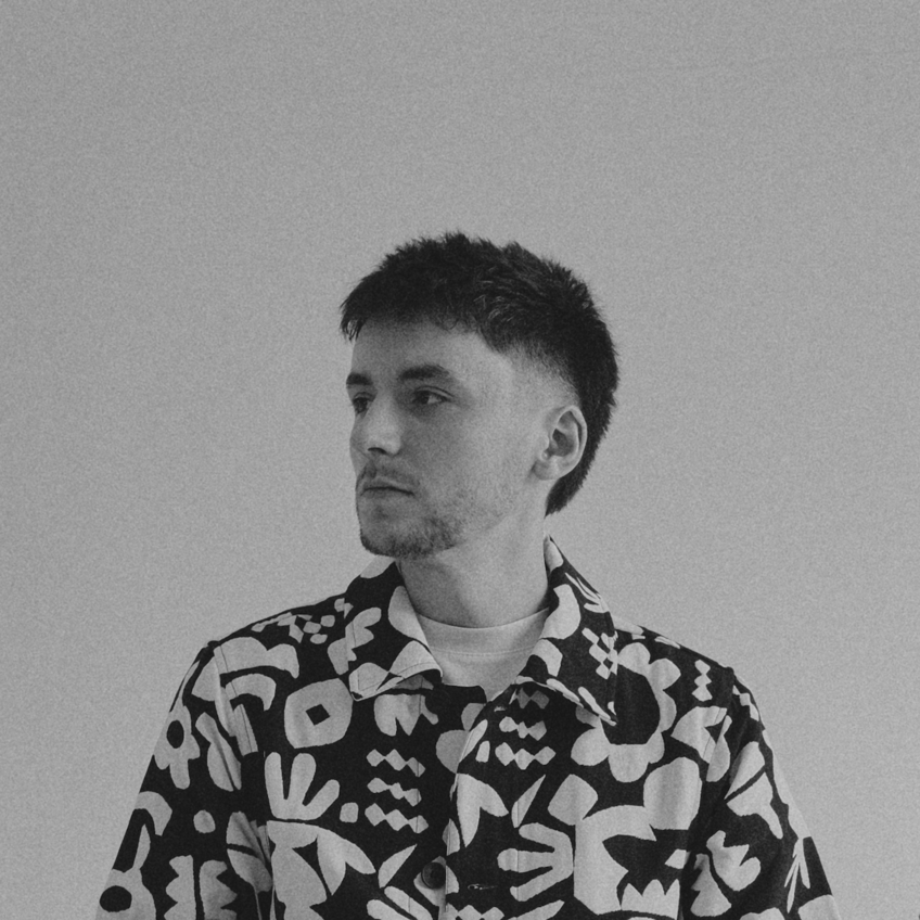 Connor kaminski holding guitar