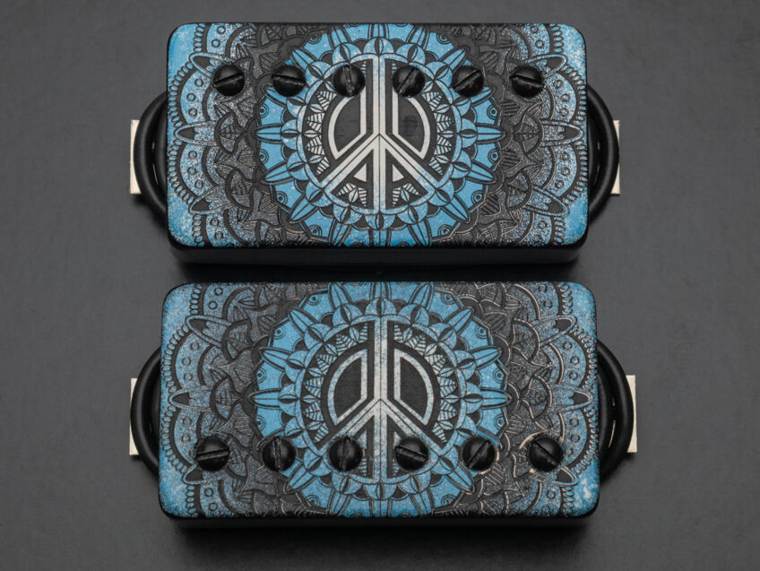 peacemaker with blue and black and white mandala