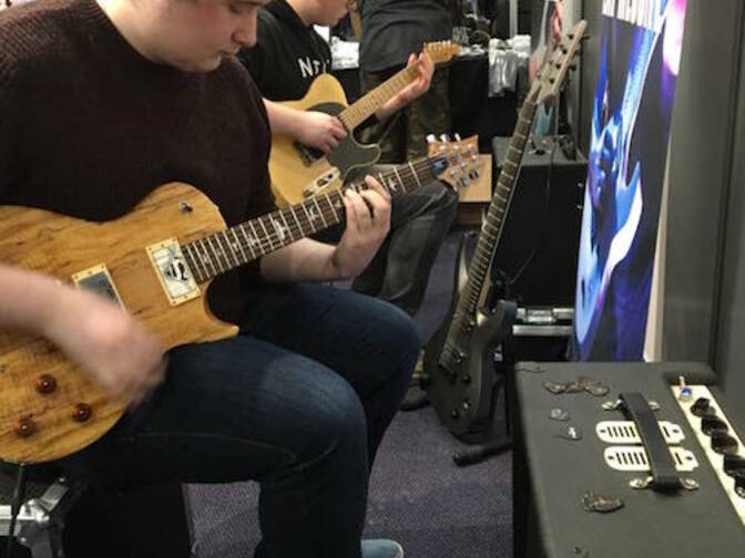 Bare Knuckle players with our guitars at the Guitar Show UK